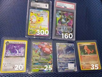 Pokemon slabs and singles ditto,pikachu surging sparks,dark dragonair,vileplume gx,glaceon,hoopa