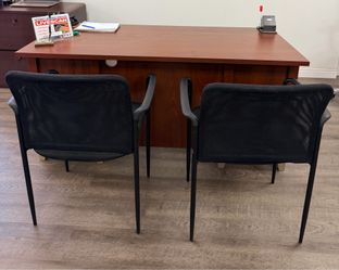 Office desk and two chairs