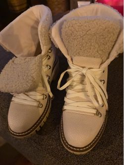 JLo white boots