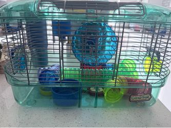 Hamster cage with toys