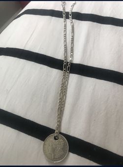 Silver chain with silver dollar coin