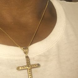 $300 10k gold chain with cross pendant