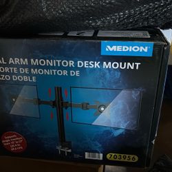 The Medion Dual Arm Monitor Desk Mount is designed to hold two monitors, specifically supporting sizes from 10 inches to 27 inches. 