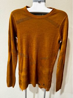 Woman Smartwool IntraknitTM Thermal Merino Base Layer Crew on Vibrant Orange Size L