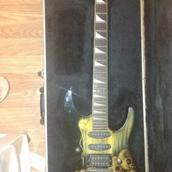 Jackson SL1 Soloist Electric Guitar ---pile 'o Skulls Artwork 