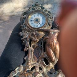 Woman antique Clock