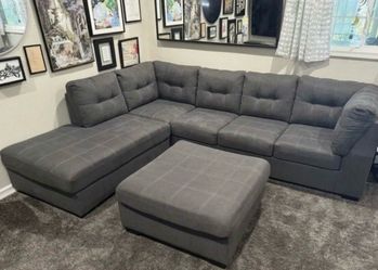 Ashley Furniture Gray Left-Facing Sectional Sofa Bed & Ottoman