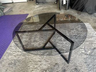 Round glass coffee table