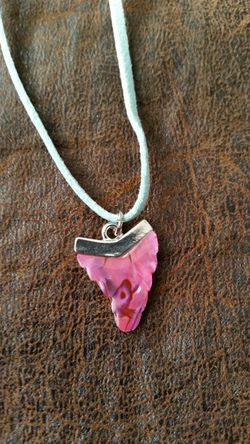 Pendant on leather necklace