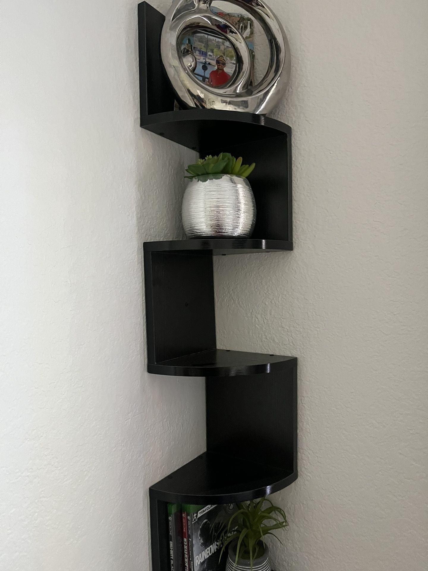Black on the wall corner shelf