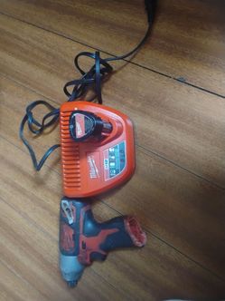Milwaukee drill charger and battery