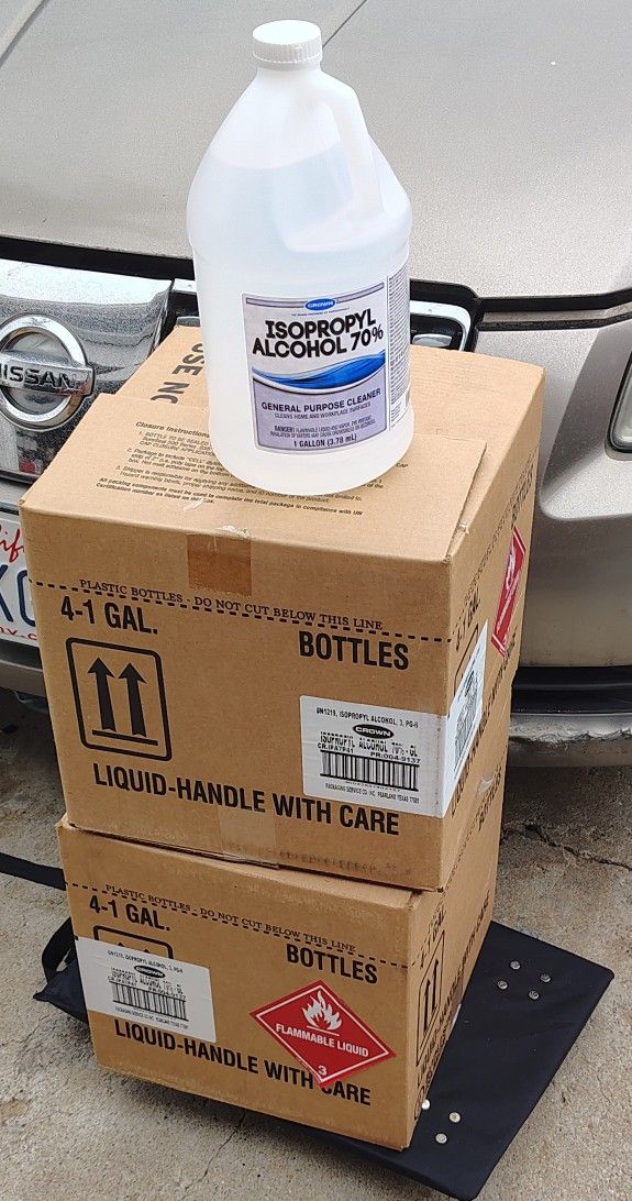 Brand-new, sealed Crown Isopropyl Alcohol 70%, 1-gallon bottles.