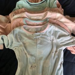 Carter’s 4T footed pajamas plus 2 long sleeve shirts