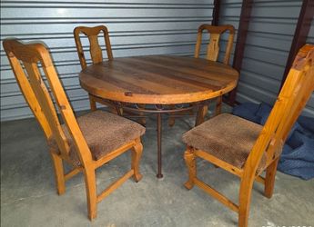 Wooden dining table with chairs