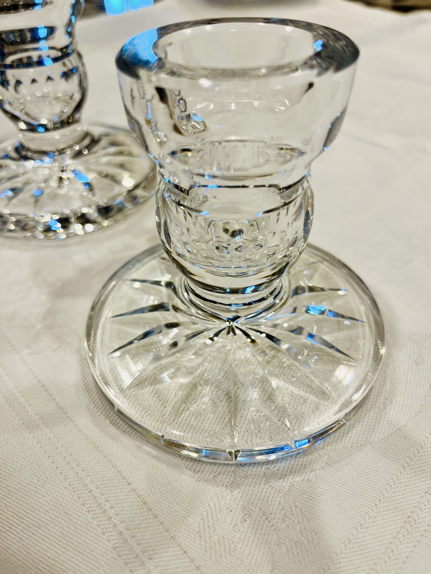 Pair of exquisite, mint condition Waterford marked “Blarney” pattern candleholders