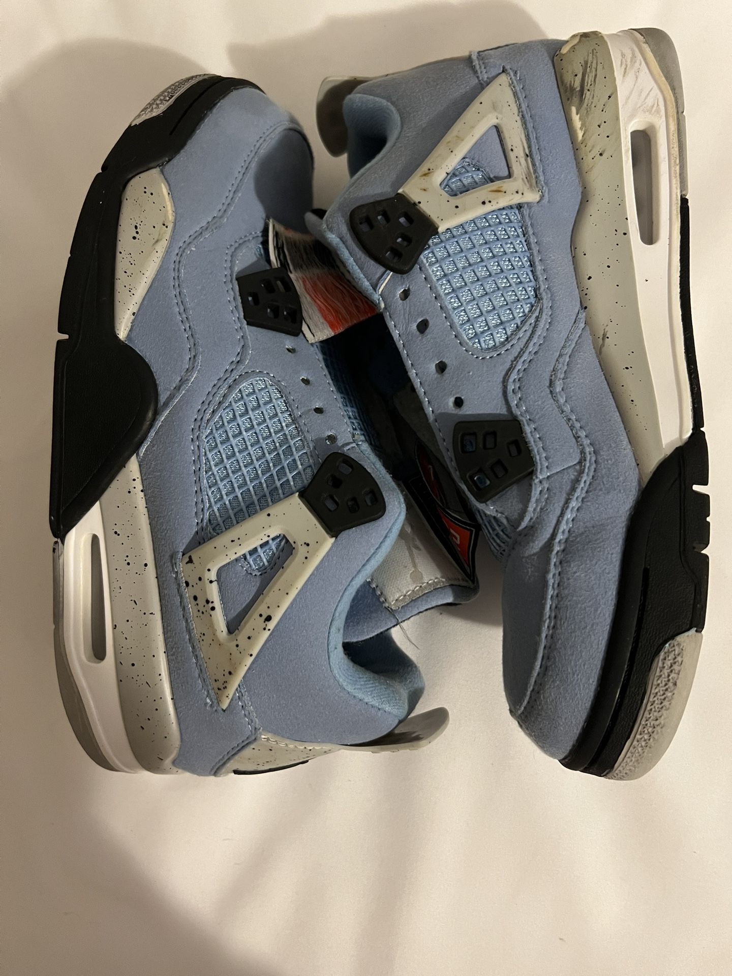 Jordan Unc 4's Mid sneakers in size 5.5
