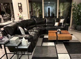 Black leather couch with ottoman