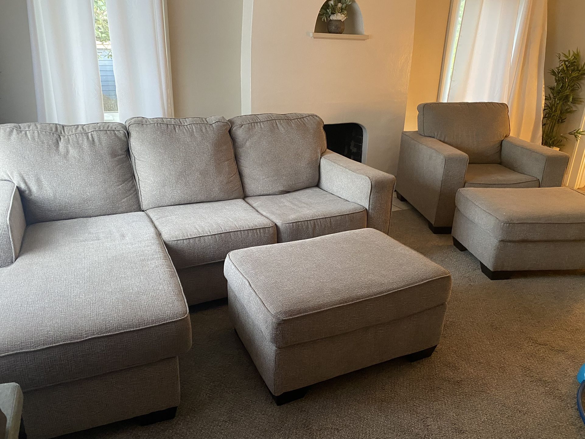 Ashely Reversible Sectional And Matching Chair
