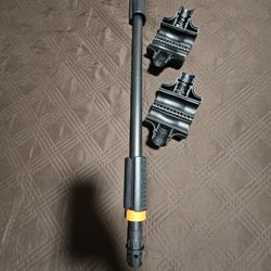 Adjustable bar for dumbbells