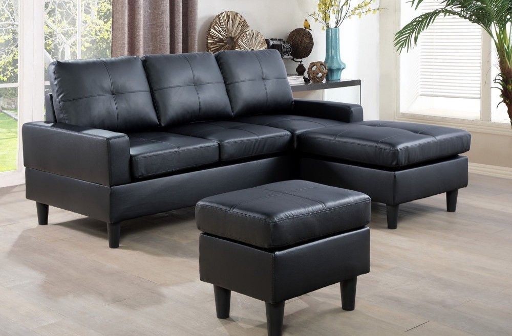 Brand New Black Leather Sectional With A Reversible Chaise & Matching Footrest