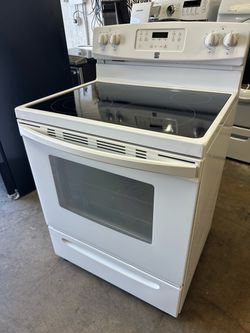 Glass Top Kenmore Stove works great delivery available
