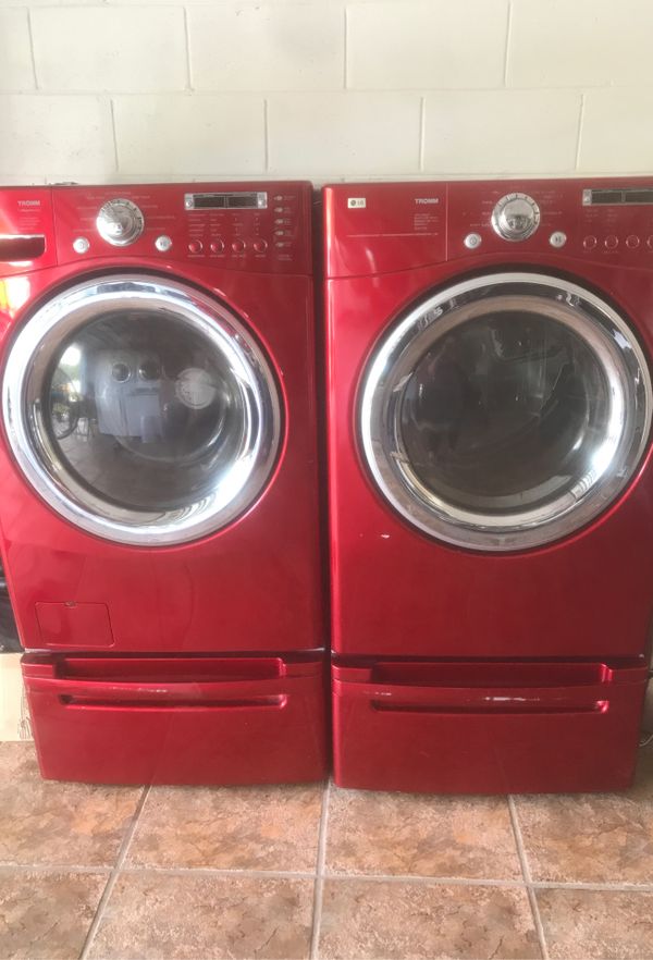 LG red washer and dryer set on pedestal for Sale in Kissimmee, FL OfferUp