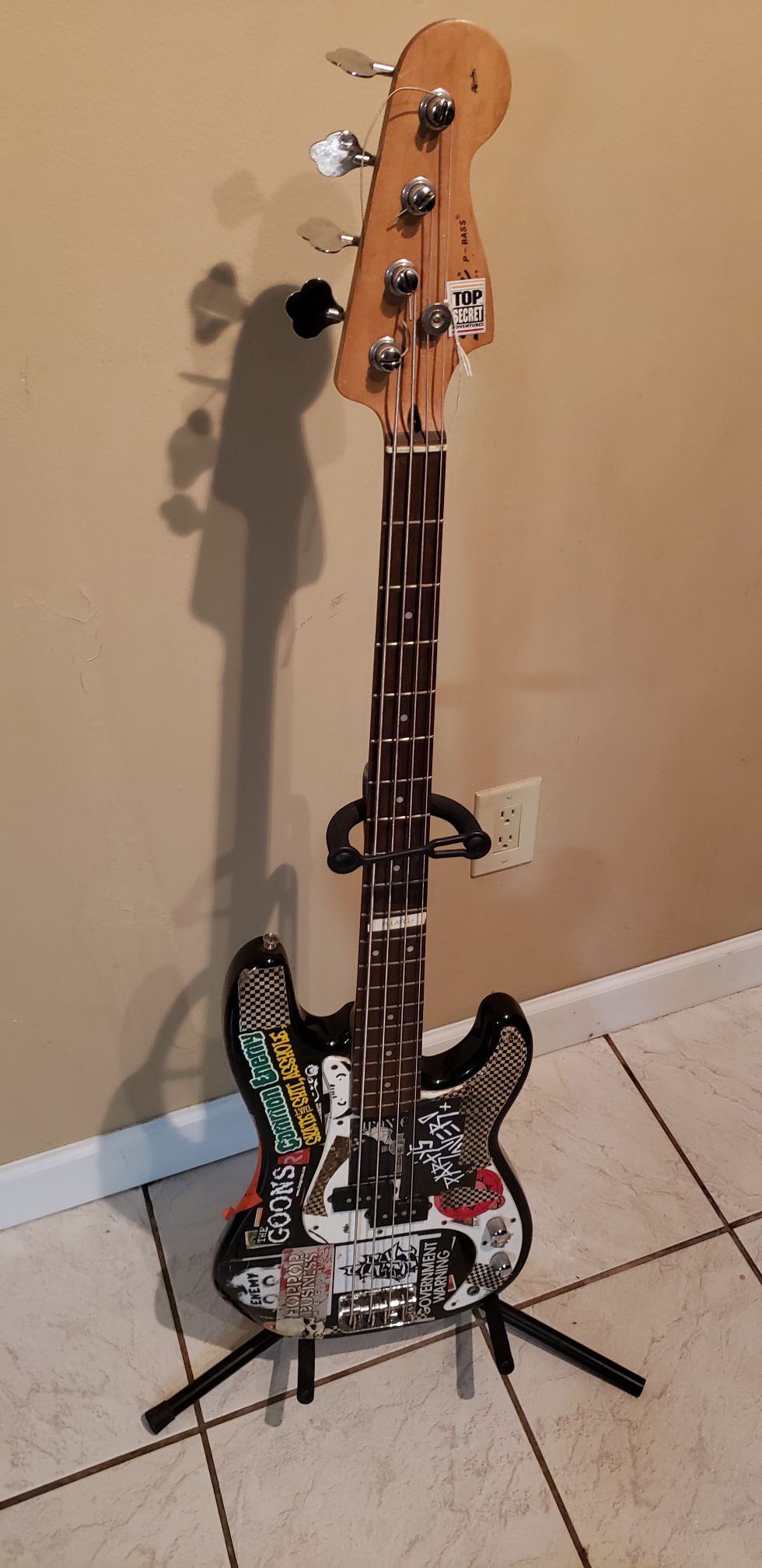 Squire bass guitar signed by rise against band