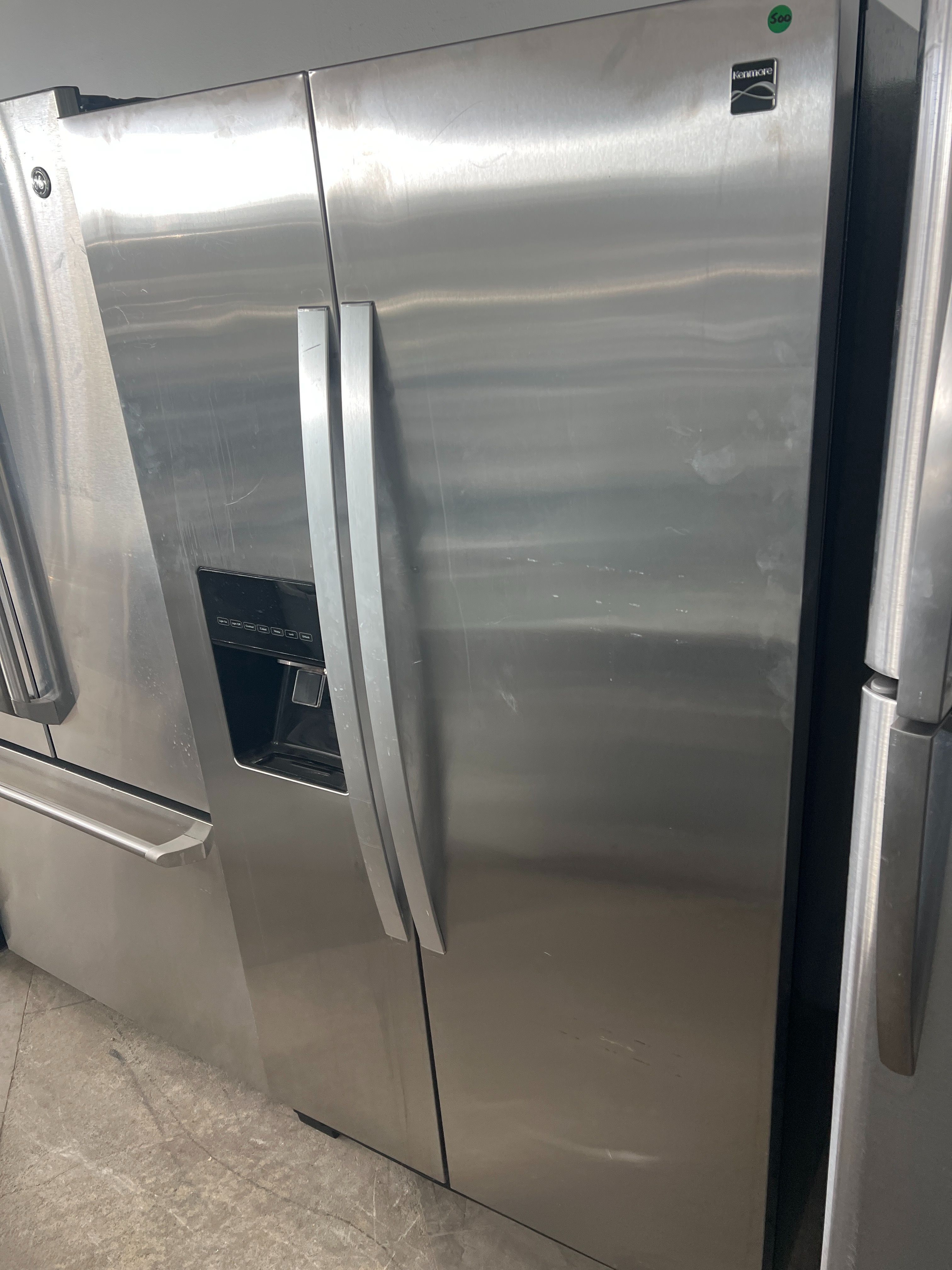 Kenmore stainless steel side by side refrigerator -free delivery
