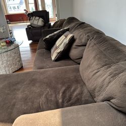 Brown fabric sectional w full sized pull out sleeper 