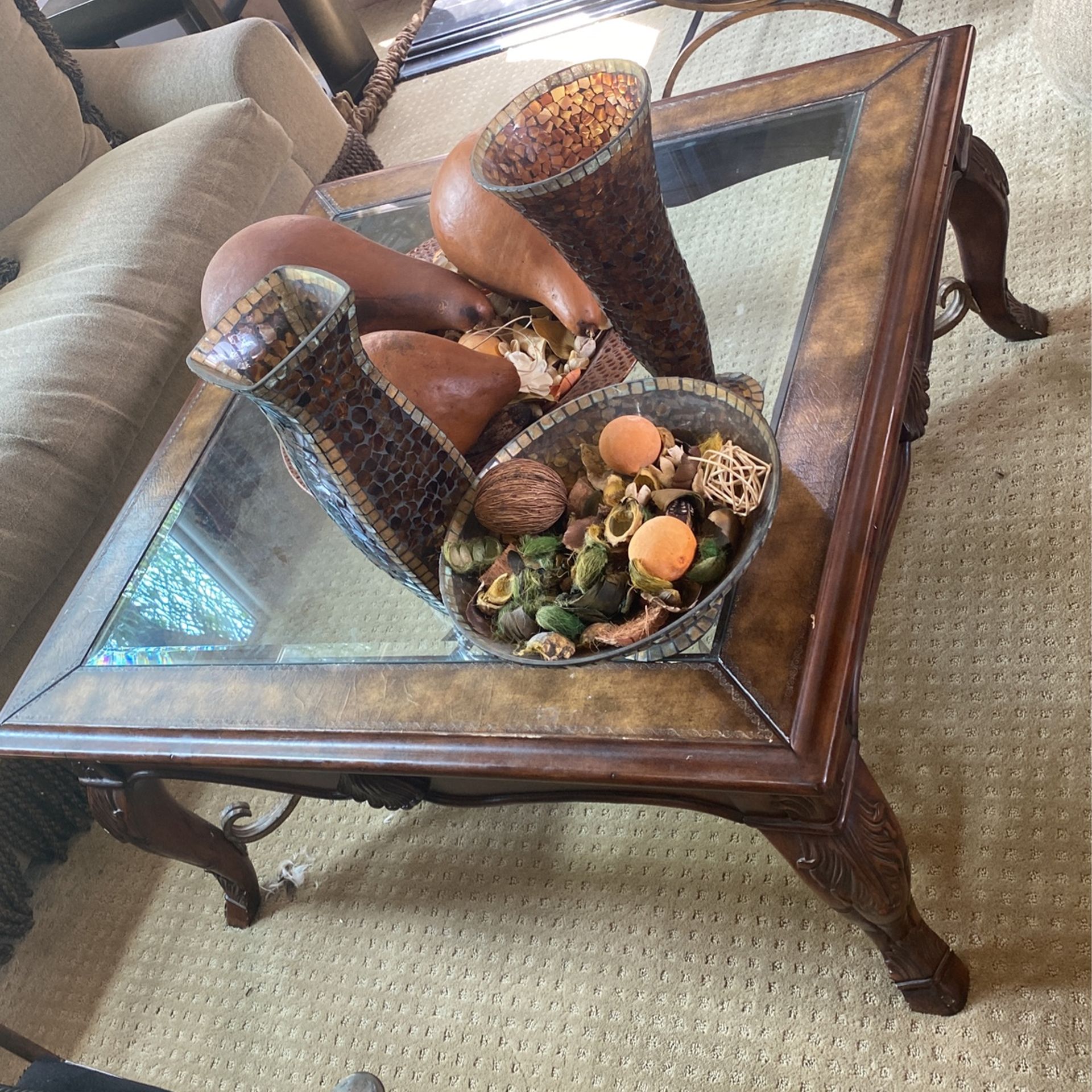 wood frame table with glass and wrought iron