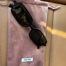 Sunglasses Miu Miu