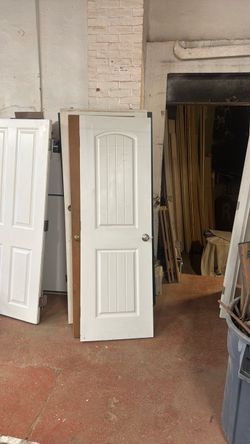 White Interior Door with Arch Panel Design