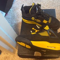 Jordan, 4s, black yellow  size 7 men’s and 8.5 women 