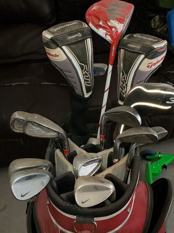Nike golf clubs with bag, range finder, side pocket full of assorted