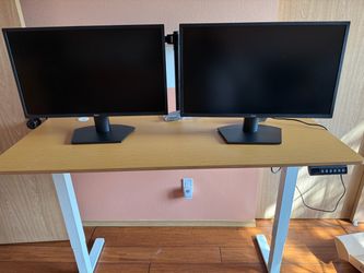 Adjustable desk, monitors with mounting bracket