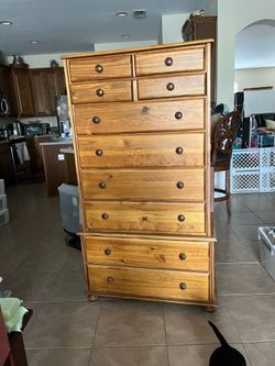 Dresser, real wood, It is 61” tall by 34” wide by 18” deep.