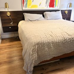 Modern Bed With Mounted Headboard And Lamps