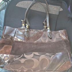 Coach purse  sold  as  is