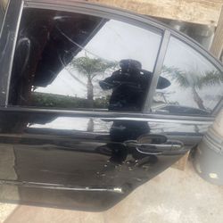 $50- BMW 325- Driver Rear Door