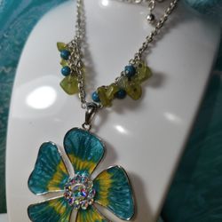 #2195, KENNNTH COLE ENAMEL FLOWER NECKLACE WITH NATUTAL STONES.
