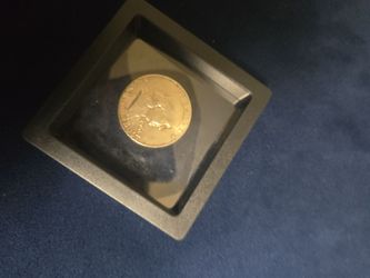 Silver half dollar good condition comes with frame