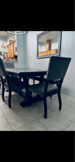 Solid dining tables with chairs and bench