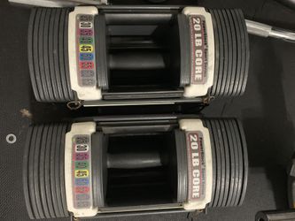 Four sets of adjustable power bock and bow flex dumbbells