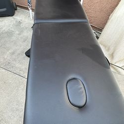 Massage table