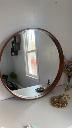 Brown hanging mirror