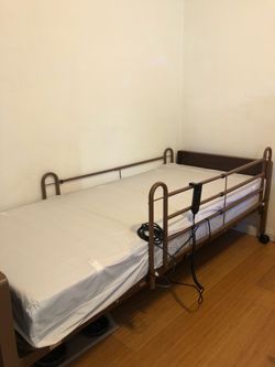 Hospital bed and lift
