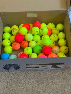 100 golf balls colors in good condition