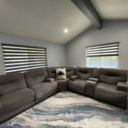 3 piece Gray sectional with 4 recliners