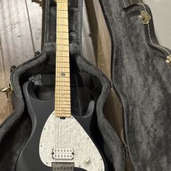 OLP Benji Madden Signature solid body electric guitar in a matte black finish