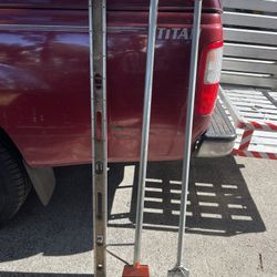 2 Floor Scrapers and one 4 ft Level $30.00 cash for all three pieces 